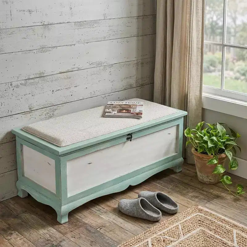 Banc rectangulaire vert en bois avec coussin d'assise et rangement intérieur